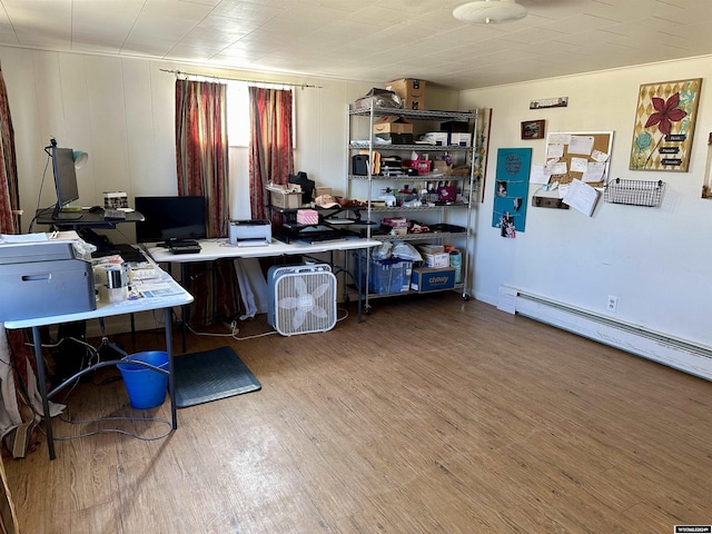 home office featuring hardwood / wood-style flooring and baseboard heating