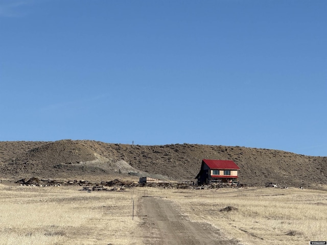 view of mountain feature with a rural view