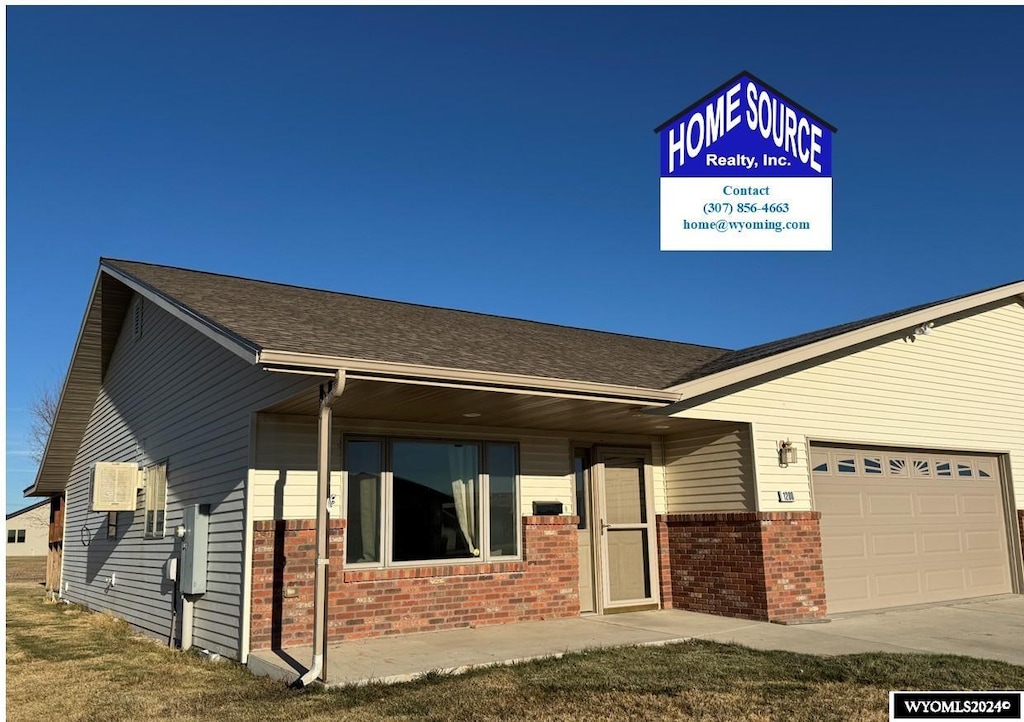 view of front of home featuring a garage