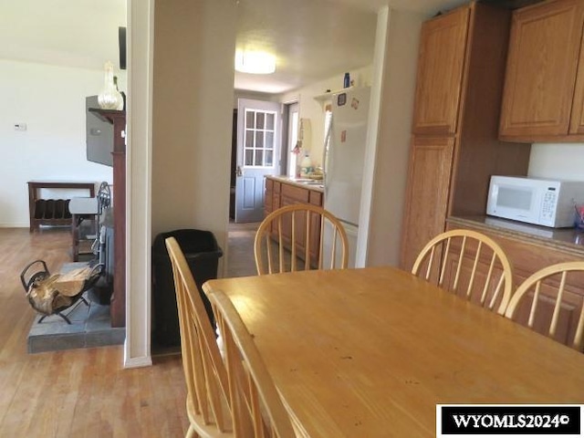 dining space featuring light hardwood / wood-style flooring