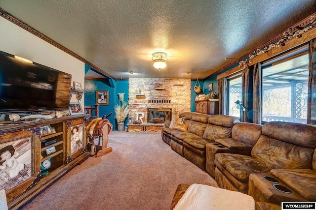 carpeted living room featuring a fireplace, a textured ceiling, and crown molding