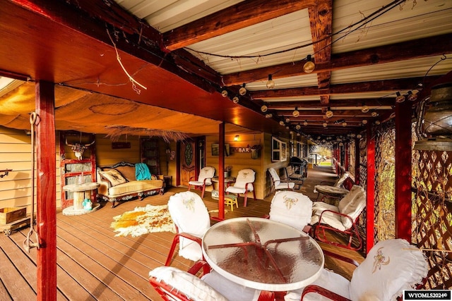 interior space featuring hardwood / wood-style flooring and wooden walls