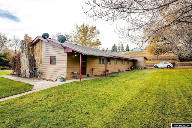 exterior space featuring a lawn