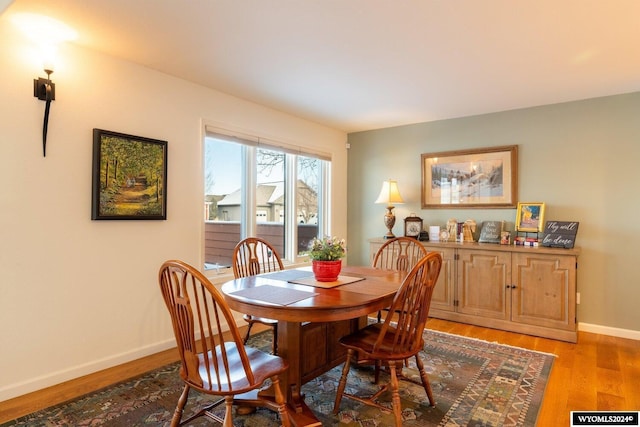 dining room featuring light hardwood / wood-style floors