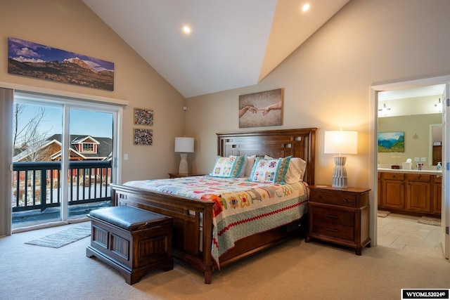 carpeted bedroom with high vaulted ceiling, access to outside, and connected bathroom