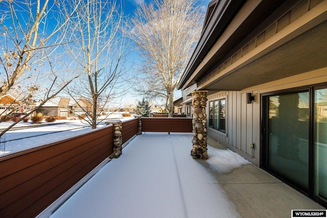 view of snow covered patio