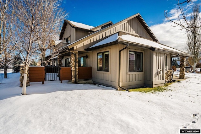 view of snow covered property