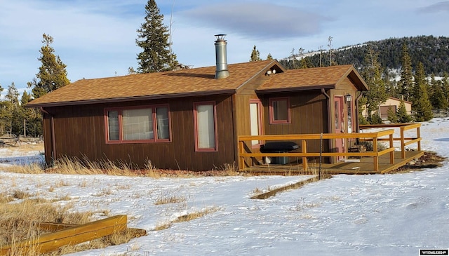 view of snow covered property