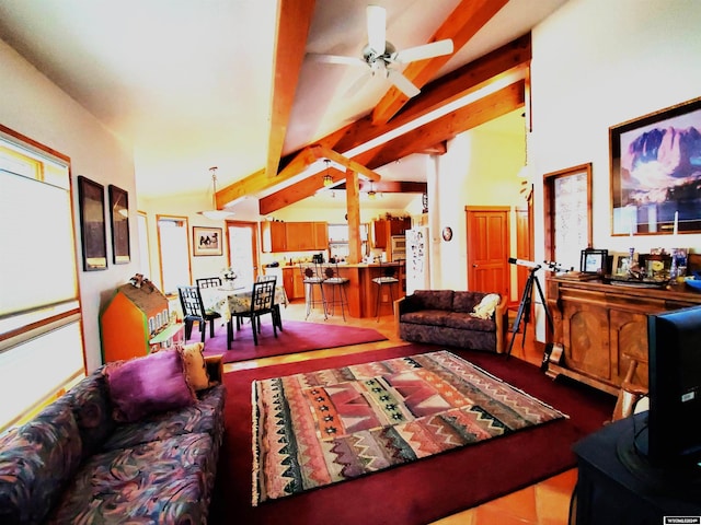 living room with vaulted ceiling with beams and ceiling fan