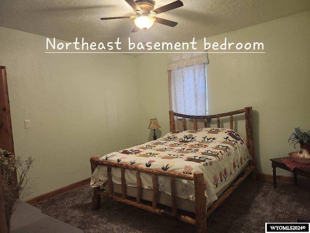 carpeted bedroom featuring a textured ceiling and ceiling fan