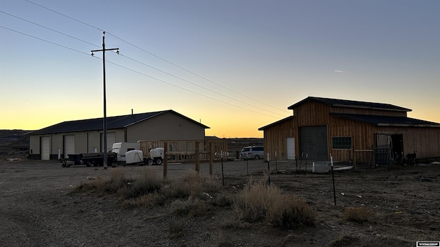 view of outdoor structure at dusk