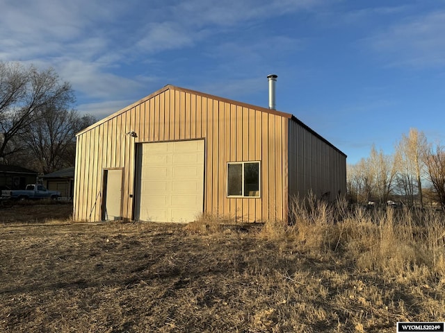 view of outdoor structure with a garage