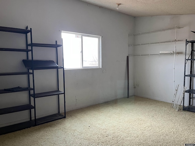 interior space featuring a textured ceiling