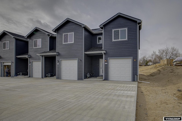 600 Badger Ln, Mills, WY 82644 - view of front facade with a garage