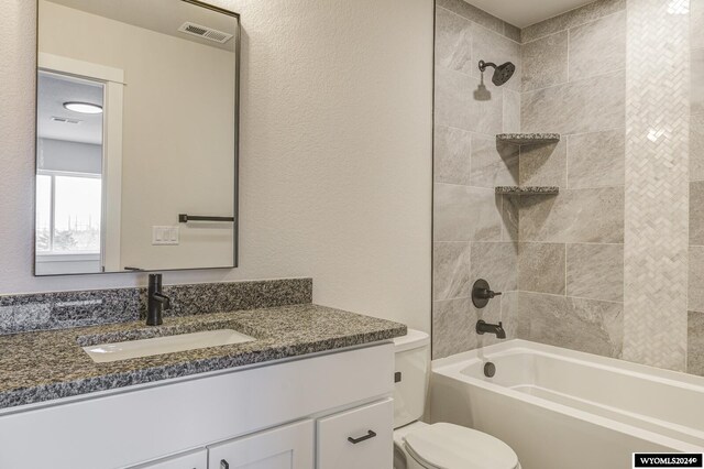 600 Badger Ln, Mills, WY 82644 - full bathroom with vanity, toilet, and tiled shower / bath