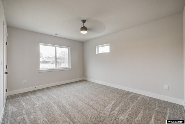 600 Badger Ln, Mills, WY 82644 - unfurnished room featuring carpet flooring and ceiling fan