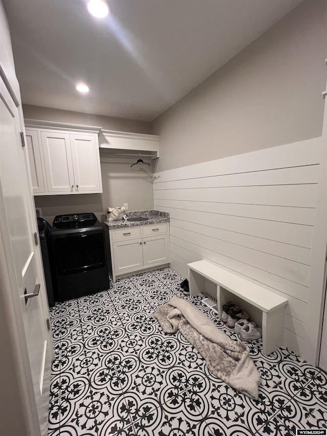 mudroom with light tile patterned floors, recessed lighting, washer / clothes dryer, and a sink