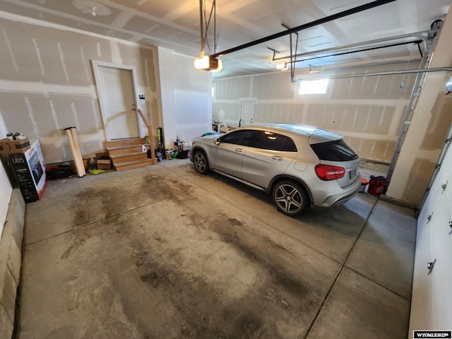 garage featuring a garage door opener