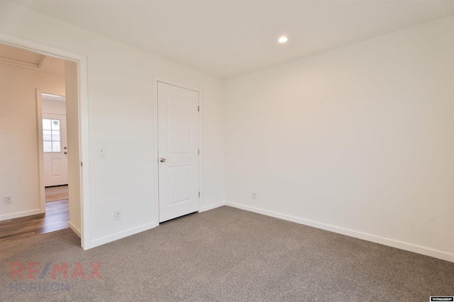 unfurnished bedroom featuring carpet