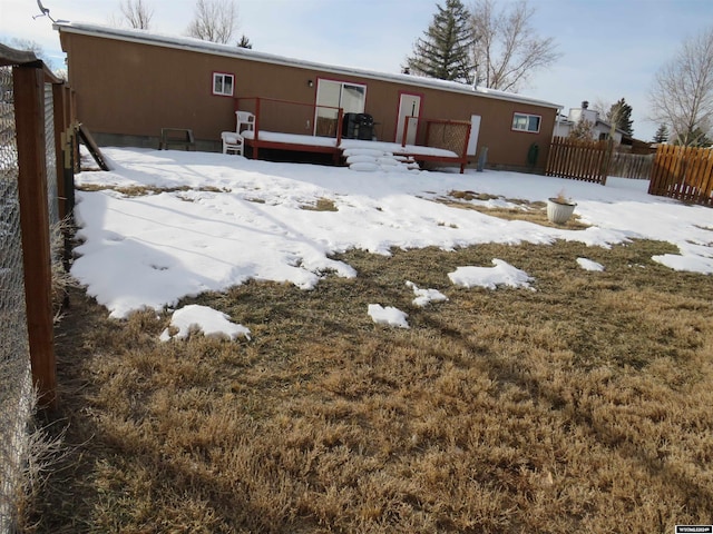 view of snow covered property