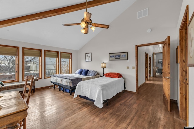 9 Spotted Tail Cir, Rock Springs, WY 82901 - bedroom with high vaulted ceiling, beam ceiling, dark wood-style flooring, and ceiling fan
