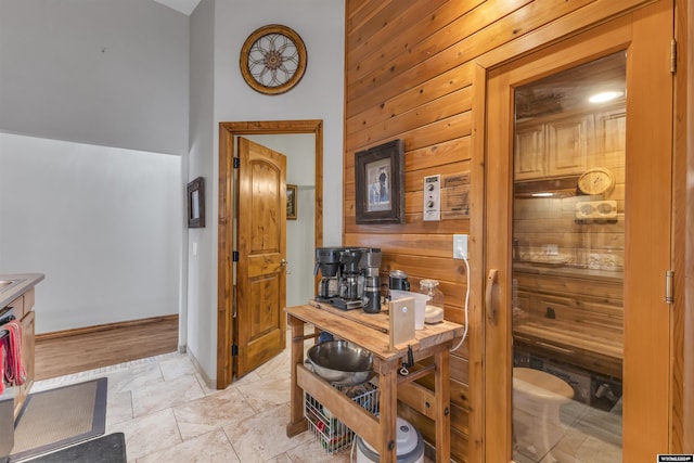 9 Spotted Tail Cir, Rock Springs, WY 82901 - office area with wood walls, a high ceiling, and a sauna / steam room