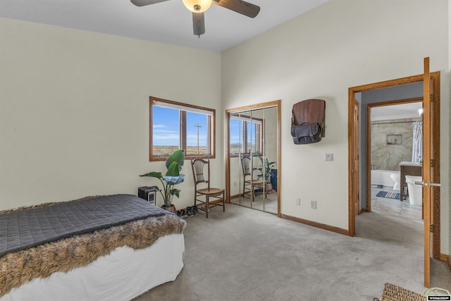 9 Spotted Tail Cir, Rock Springs, WY 82901 - carpeted bedroom with a closet and a ceiling fan