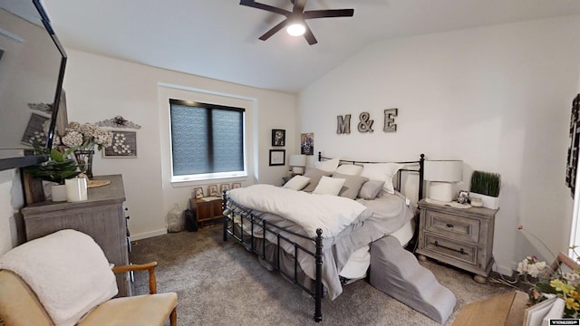 carpeted bedroom with ceiling fan and lofted ceiling