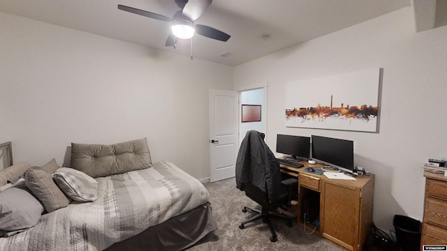 bedroom with ceiling fan and carpet