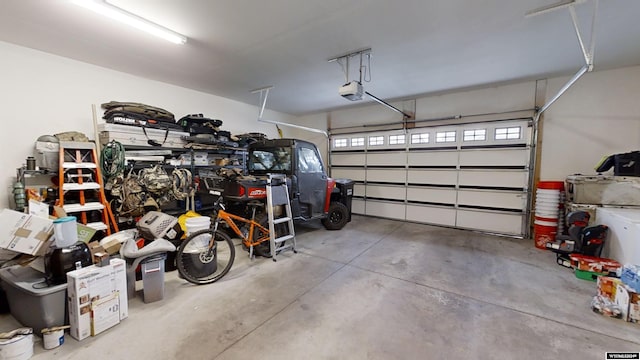 garage featuring a garage door opener