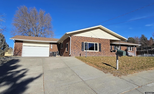 single story home with a garage