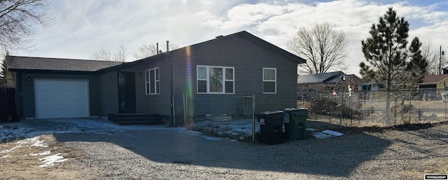 view of property exterior with a garage