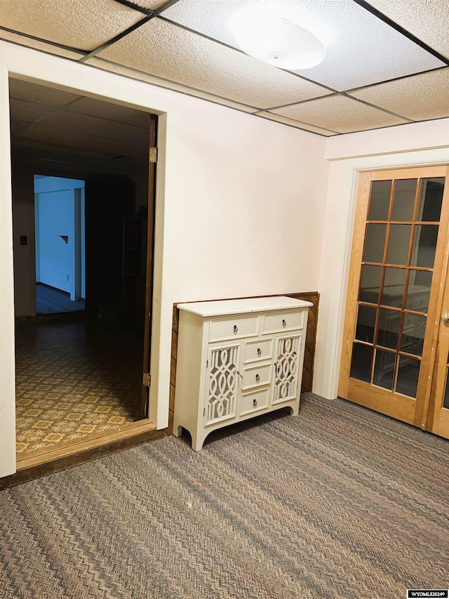 interior space featuring a paneled ceiling