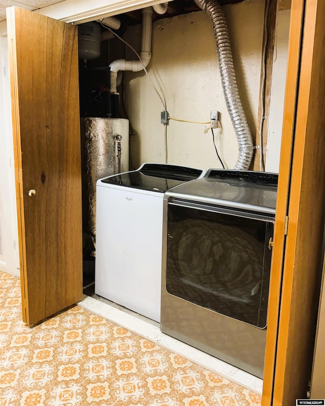 laundry area with independent washer and dryer