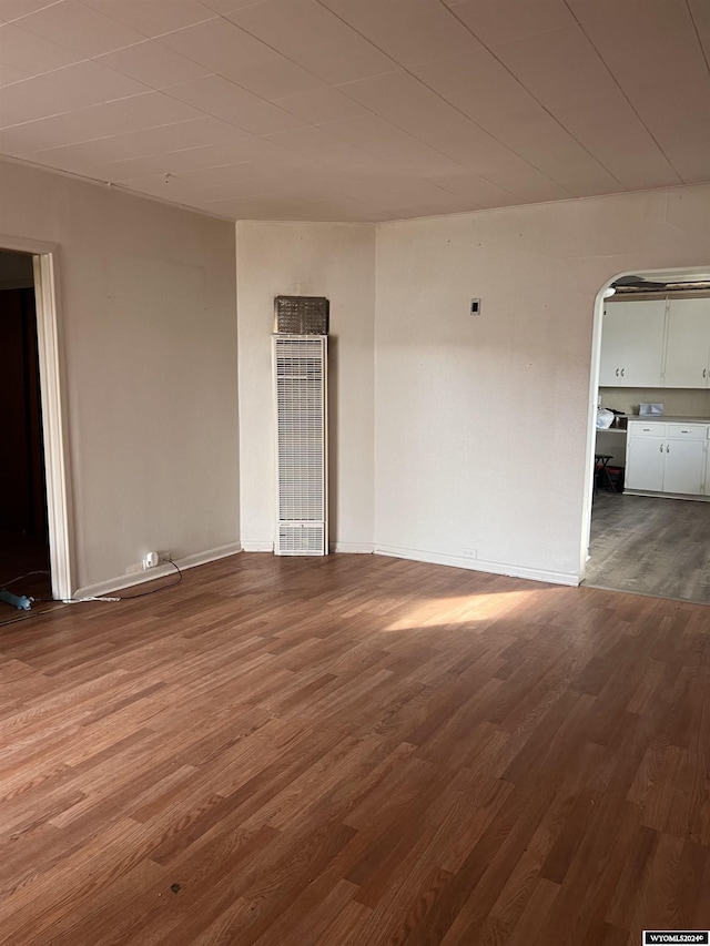 unfurnished room featuring hardwood / wood-style floors