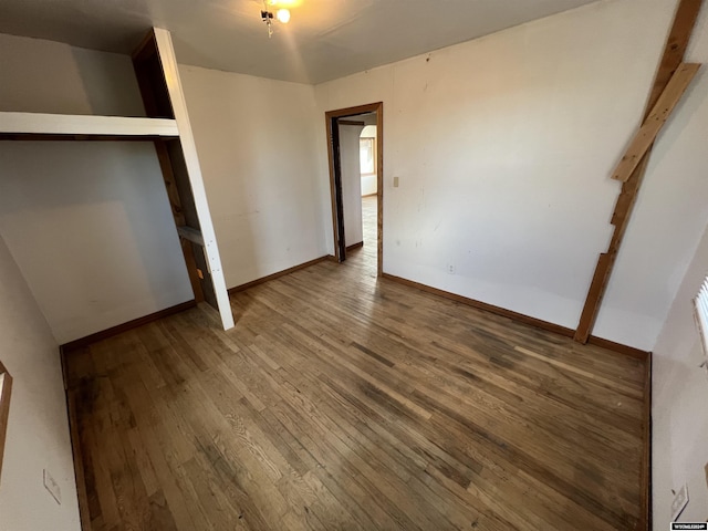 unfurnished bedroom featuring wood-type flooring