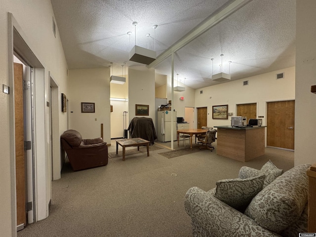 carpeted living room featuring a textured ceiling and high vaulted ceiling