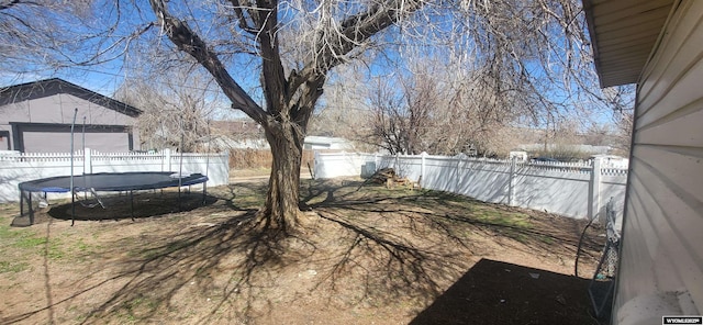 500 Madison, Rawlins, WY 82301 - view of yard with a fenced backyard and a trampoline