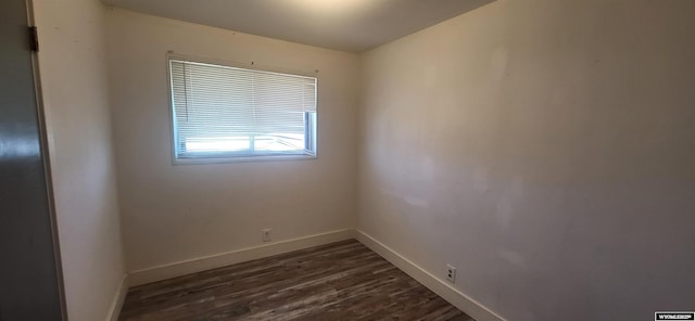 500 Madison, Rawlins, WY 82301 - empty room with baseboards and dark wood finished floors
