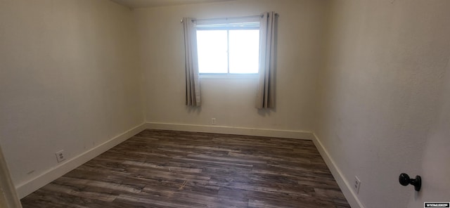 500 Madison, Rawlins, WY 82301 - empty room featuring baseboards and dark wood finished floors