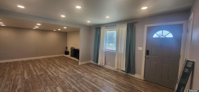 500 Madison, Rawlins, WY 82301 - foyer featuring baseboards, recessed lighting, dark wood-style flooring, and a healthy amount of sunlight