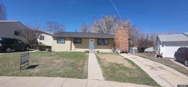 500 Madison, Rawlins, WY 82301 - bungalow with a chimney and driveway