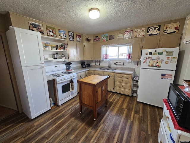 kitchen with sink, dark hardwood / wood-style floors, butcher block countertops, a textured ceiling, and white appliances