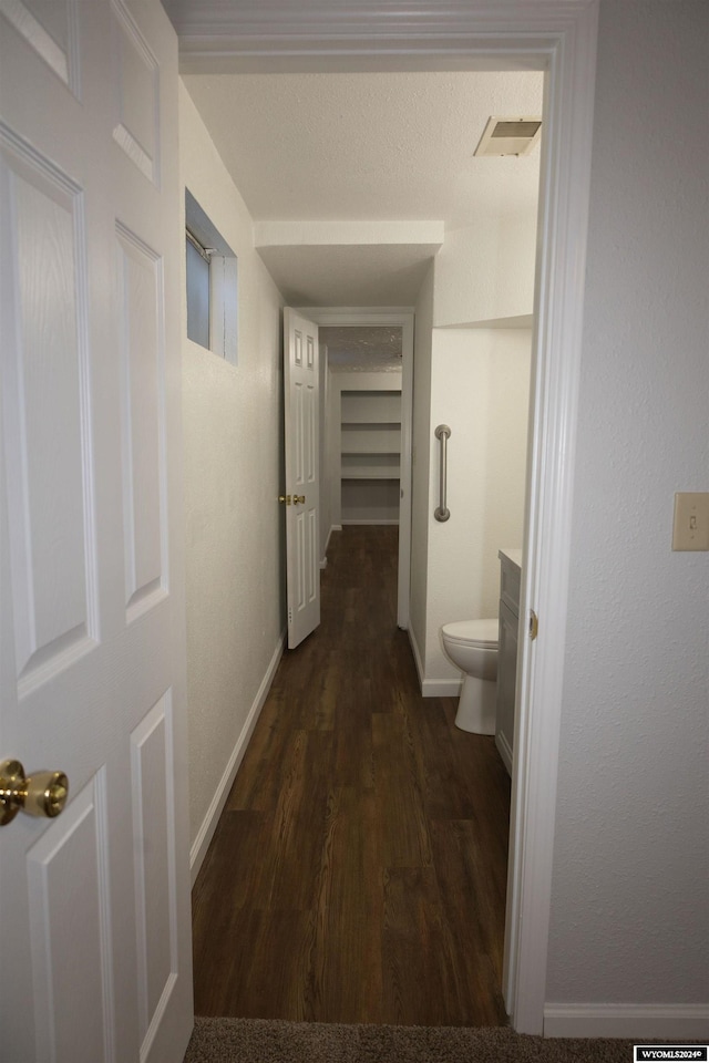 hall featuring dark hardwood / wood-style flooring