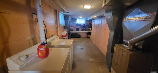 basement with washing machine and dryer