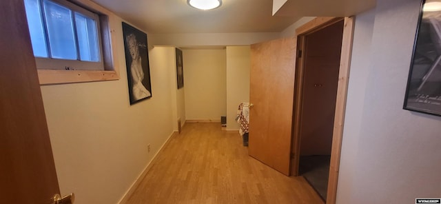 hall with light hardwood / wood-style flooring