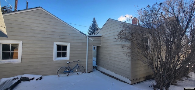 view of snow covered property