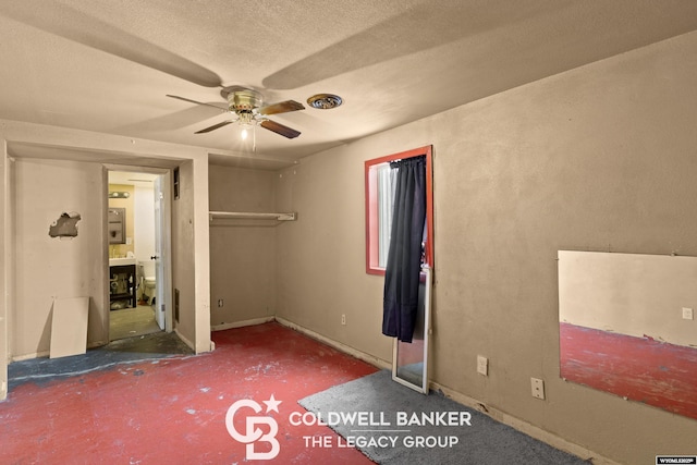 unfurnished bedroom with baseboards, visible vents, and a textured ceiling