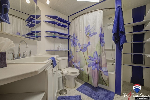 full bathroom featuring vanity, toilet, and shower / bath combo with shower curtain