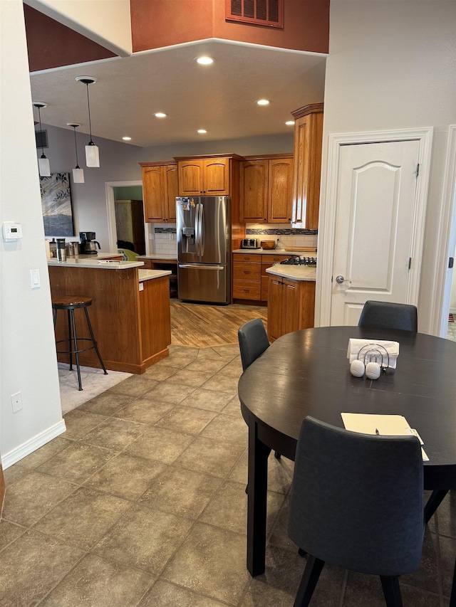 dining area with lofted ceiling